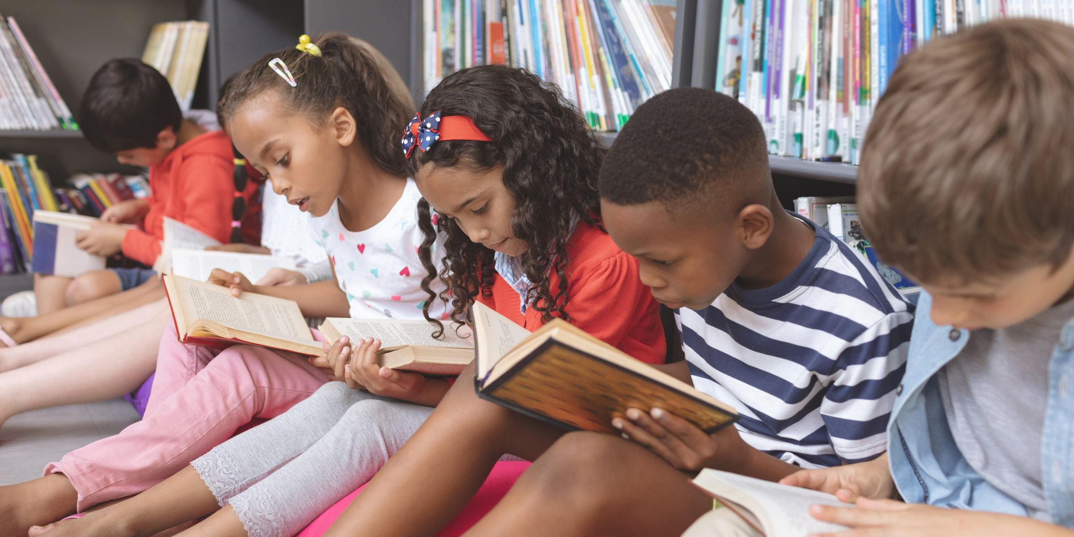 Children reading in a library.